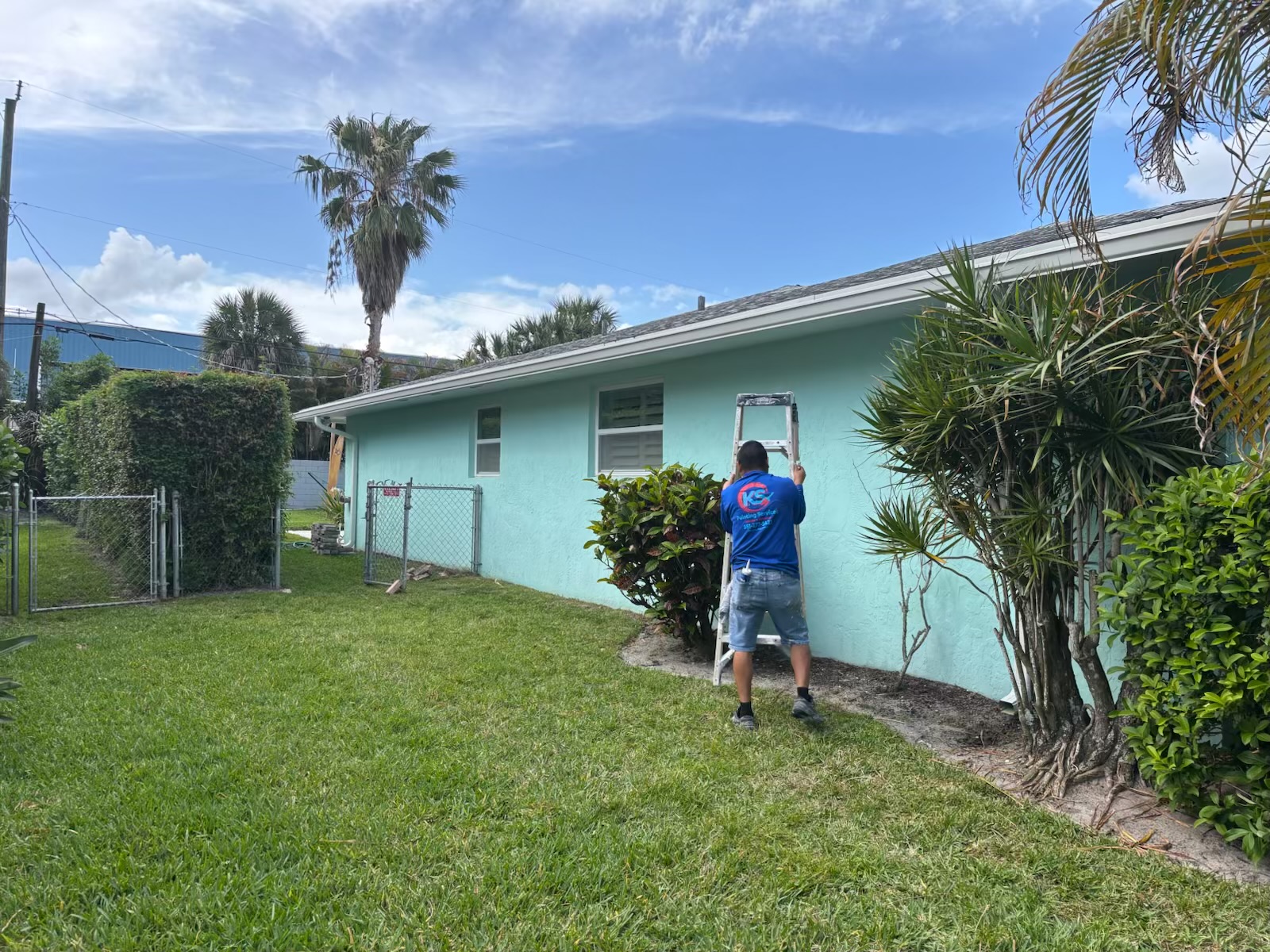 Exterior side painting project with aqua finish