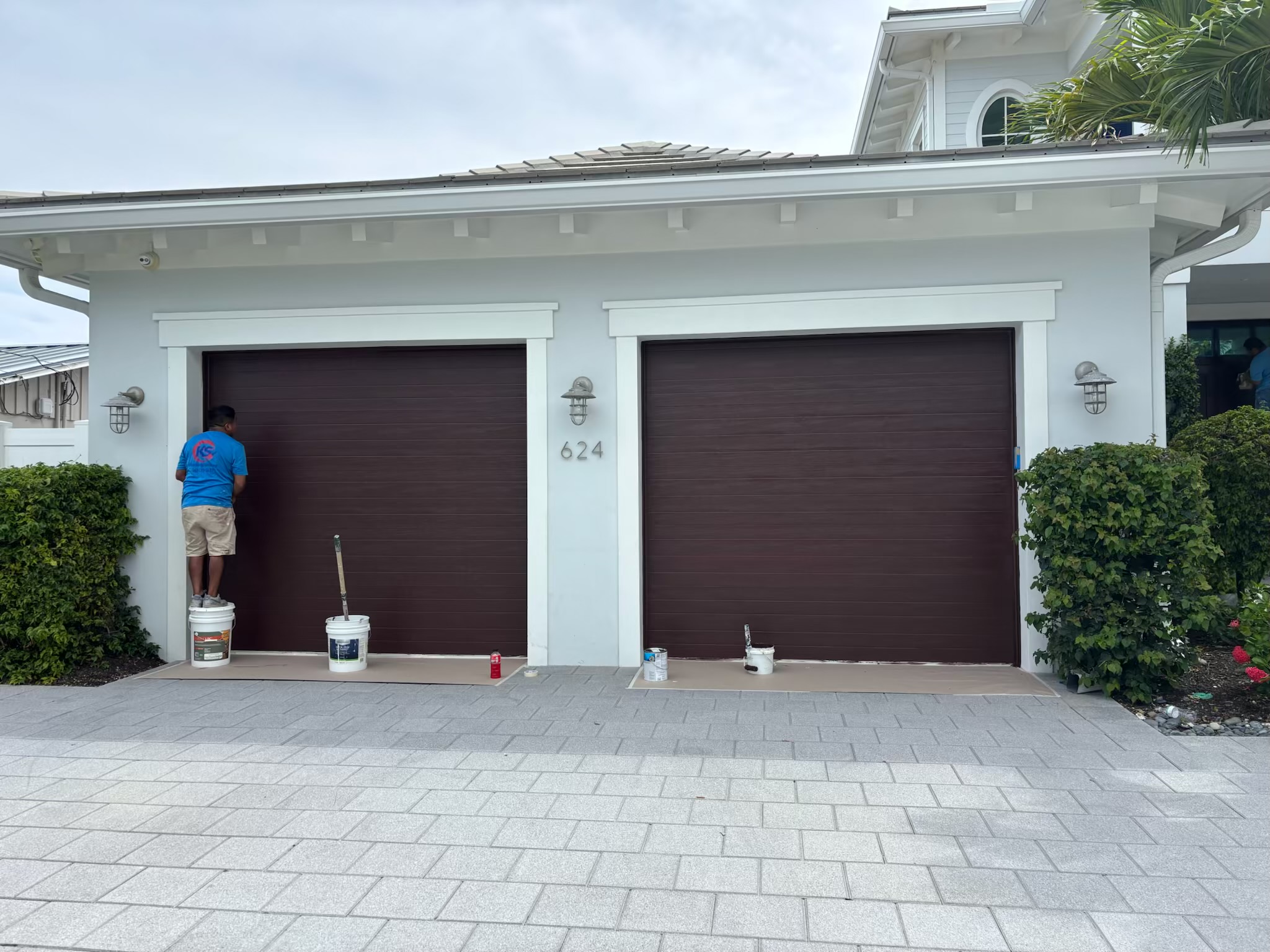 Dark finished garage doors by KS Painting Palm Beach LLC