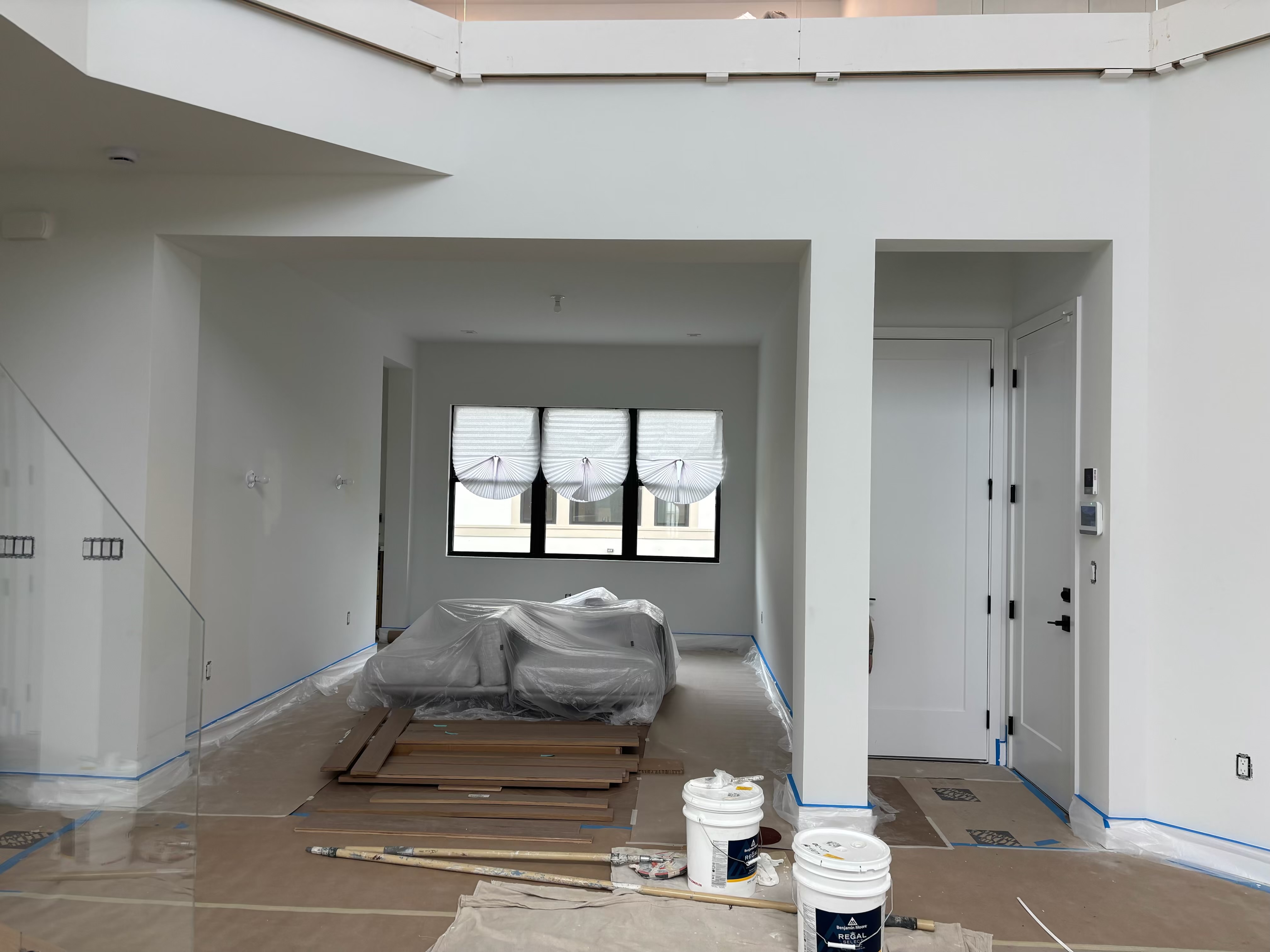 Open living room with fresh white interior paint